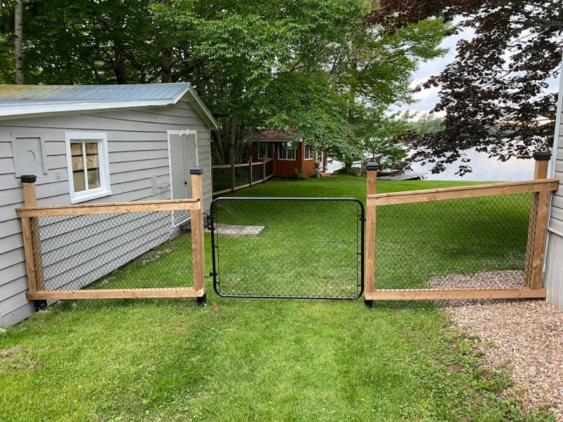 Wood fence detail by Versatile Home Solutions
