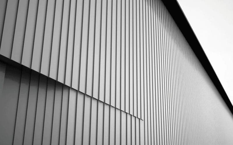 Standing seam metal roofing detail and ridge cap